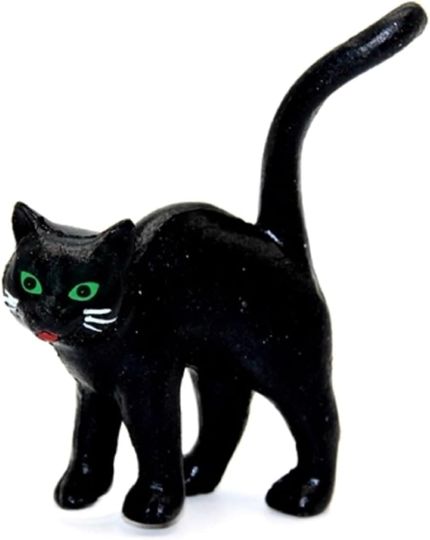 A miniature cat figure for holiday elf setups.