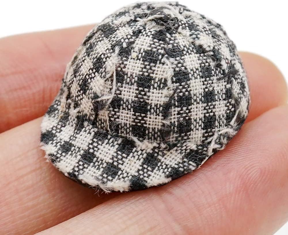 A miniature cap for holiday elf setups.