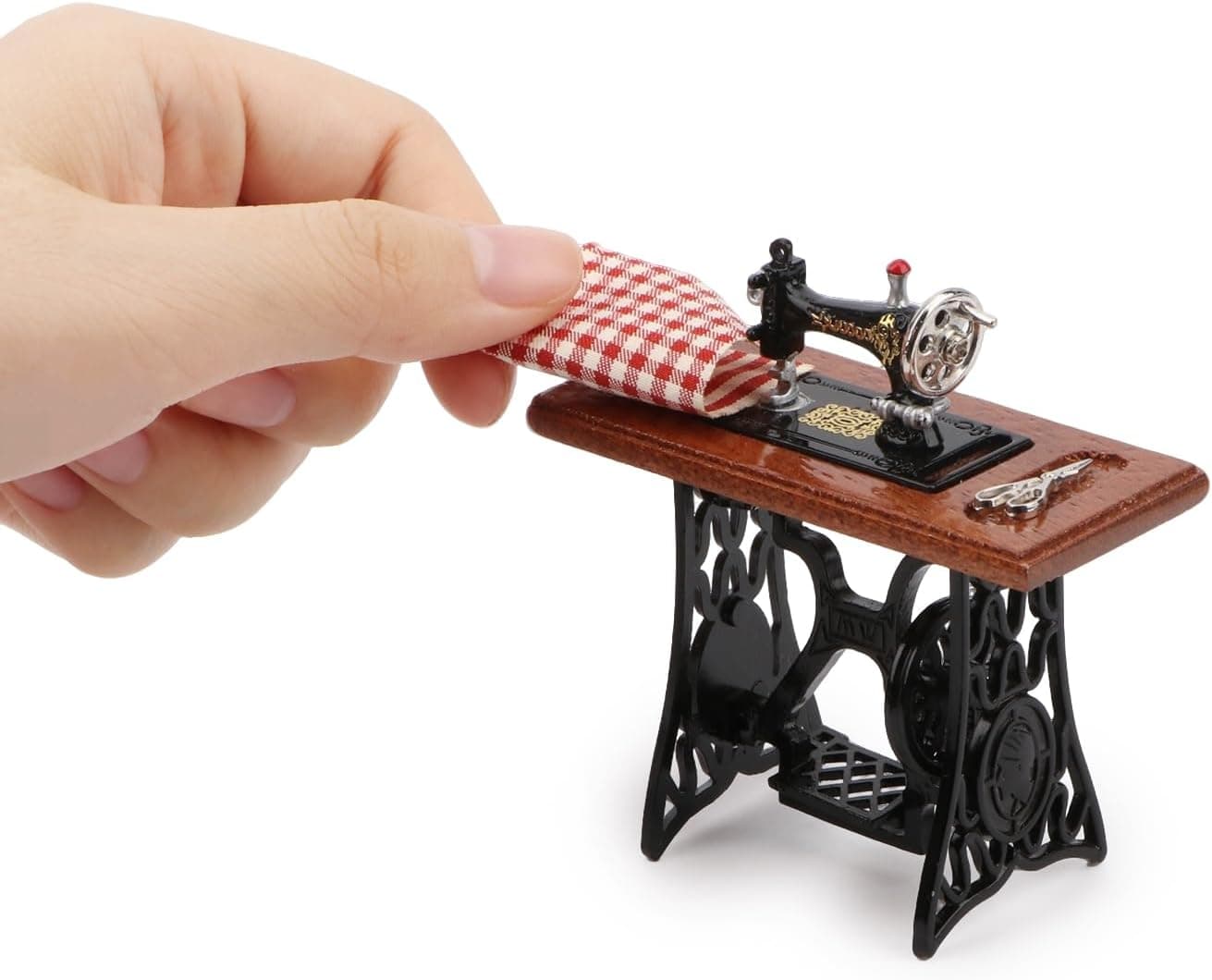 A miniature sewing machine for holiday elf setups.