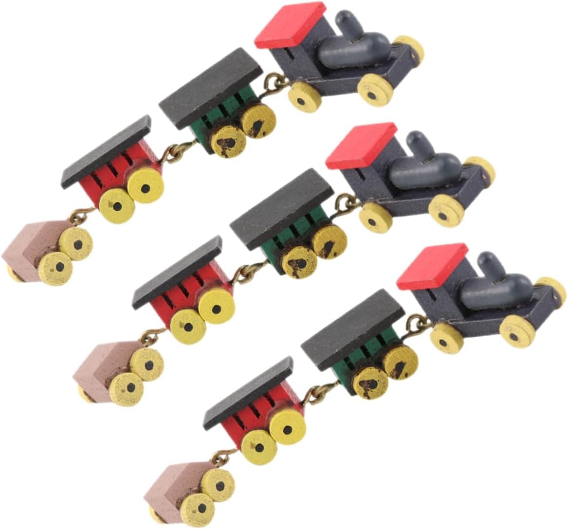 Miniature wooden trains for holiday elf setups.