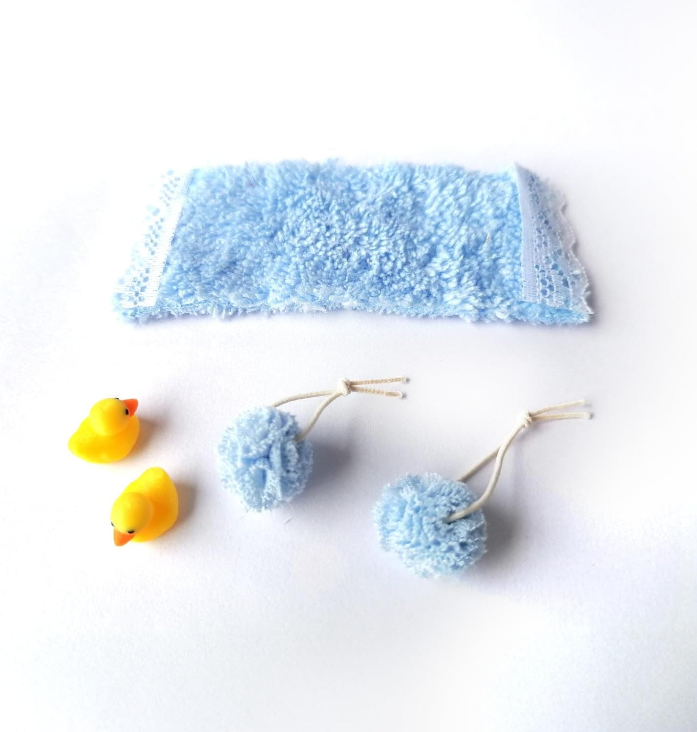 A miniature duck and towel for holiday elf setups.