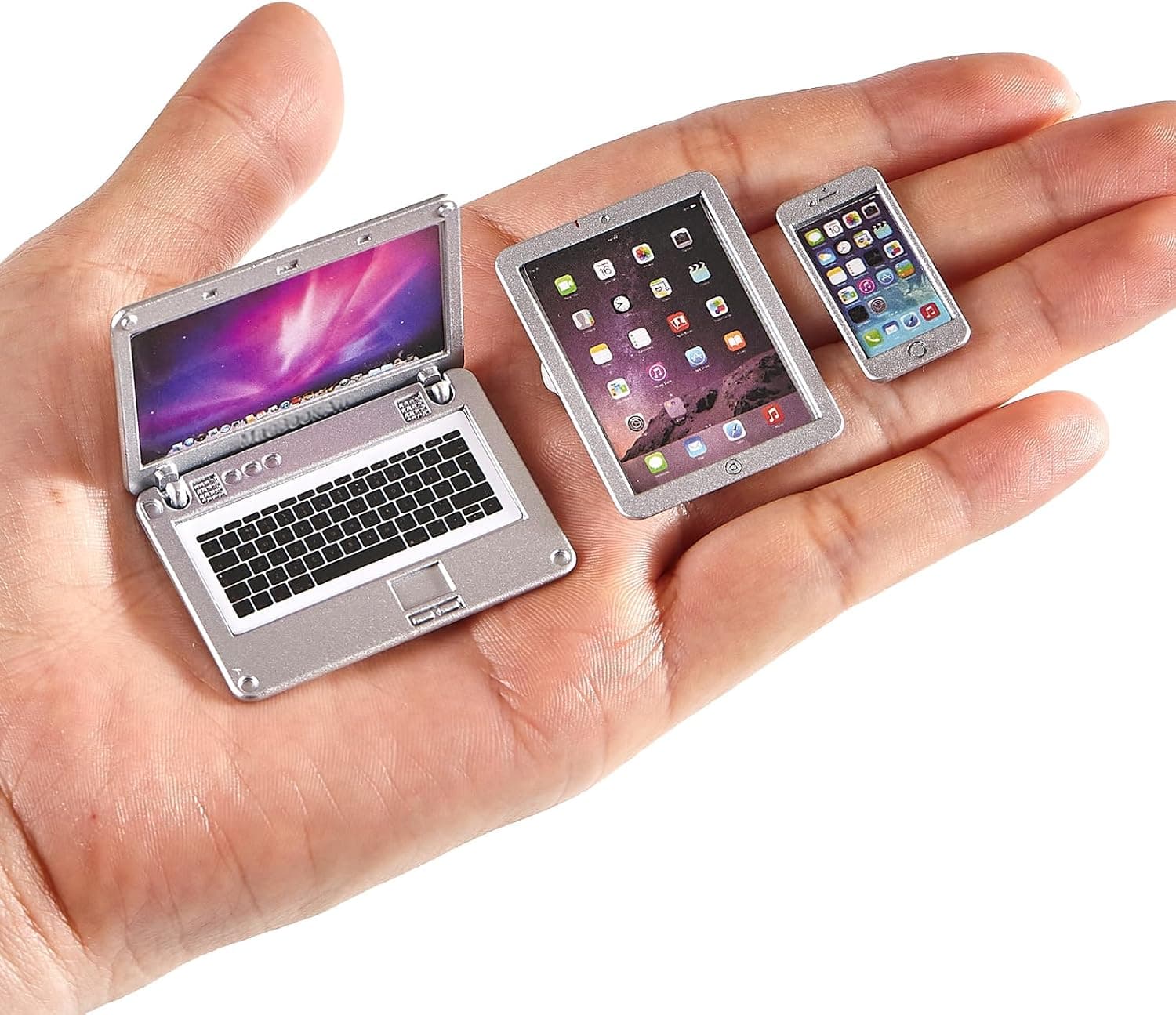 A miniature laptop set for holiday elf setups.