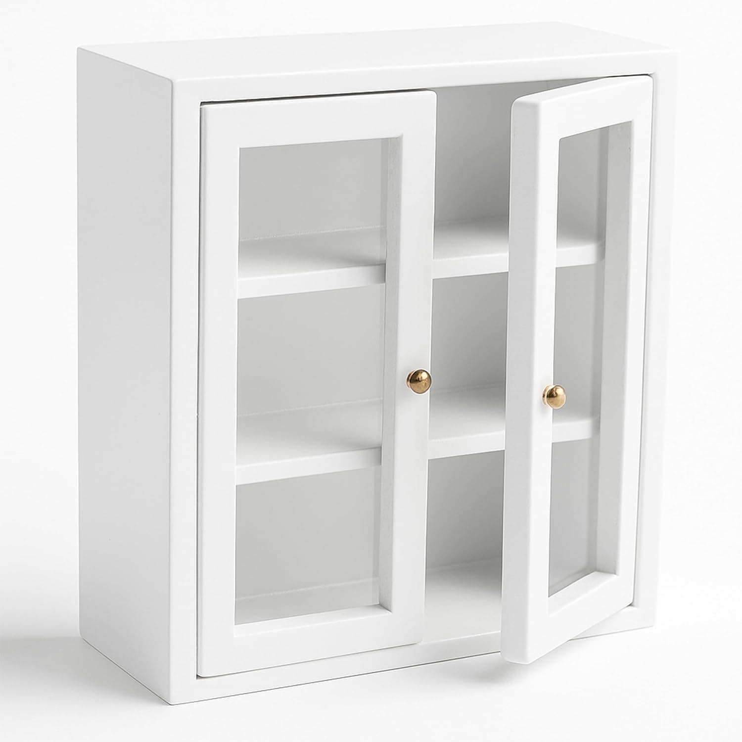 A miniature wall cupboard for holiday elf setups.